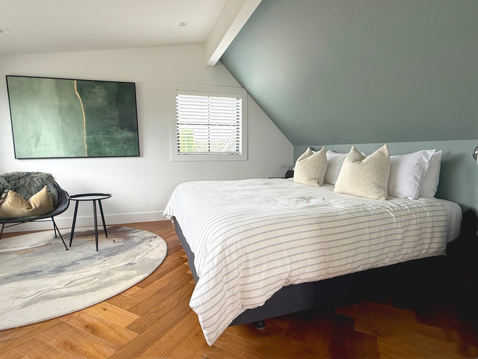 Master bedroom in the Olive Grove Cottage at Putiki Estate, luxury accommodation on Waiheke Island.